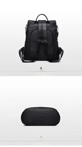 Detail view of the black backpack featuring woven texture, back zipper pocket and base