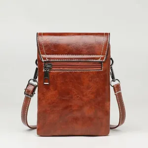 Brown oil wax leather mini crossbody cell phone bag with white contrast stitching
