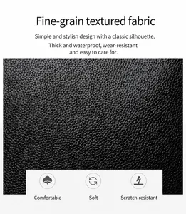 Detailed close-up of durable black litchi grain leather texture with scratch resistance