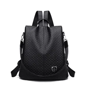 Black woven textured backpack with silver logo and adjustable straps for casual travel