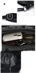Macro view of polished metal hardware and internal storage compartments of the black bag