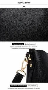 Detail of premium black lychee leather texture and golden metal strap buckles on handbag