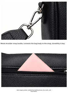 Close-up of black lychee leather bag showing metal strap buckle and rear zipper pocket