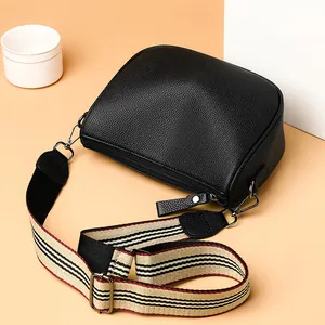 Classic black litchi pattern PU leather saddle bag with striped wide shoulder strap