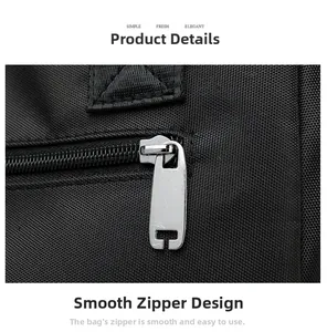 Detail of smooth silver metal zipper and durable black nylon fabric on the large tote bag