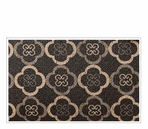 Detail des Vintage-Monogramm-Musters auf strukturiertem Canvas mit braunen Motiven