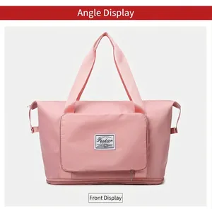 Dettaglio borsa yoga rosa con estensione zip sul fondo e manici in tela intrecciata