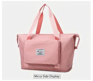 Borsa da viaggio rosa impermeabile con separazione secco-umido e zip di estensione fondo