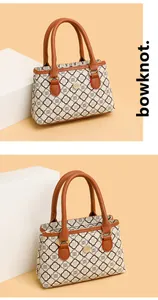 Detail der eleganten Retro-Tasche mit braunem Kleeblattmuster und goldener Plakette