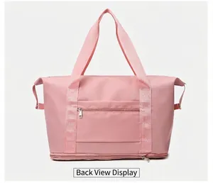 Vista posteriore della borsa da viaggio rosa con tasca zip e strato di espansione