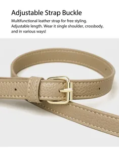 Detail of adjustable khaki leather shoulder strap with golden metal buckle and stitching