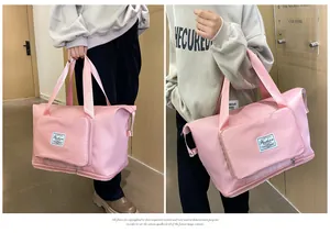 Bolso de viaje rosa de gran capacidad con fondo extensible y bolsillo frontal con cremallera