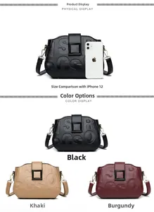 Detailed size comparison of a textured cross-body bag next to an iPhone 12 in high quality