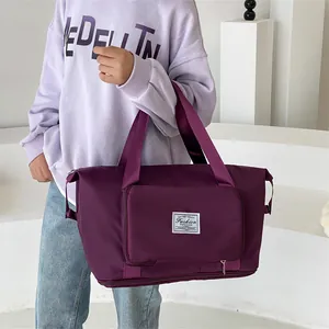 Bolsa de viaje grande morada con fondo extensible y bolsillo frontal para gimnasio
