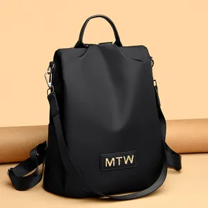 Versatile black oxford cloth backpack for women featuring large capacity and MTW logo