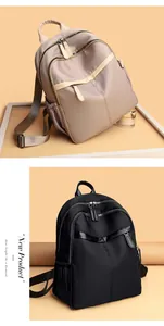 Detailed comparison of khaki and black nylon mini backpacks with multi-zipper pockets