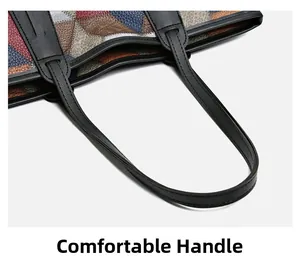 Detail of multi-color geometric patchwork tote bag with comfortable black handles