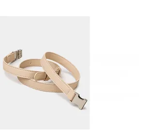 Adjustable beige leather shoulder strap with silver buckle detail and fine stitching