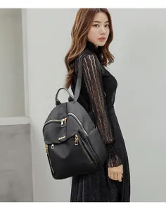 Fashionable black oxford backpack for women with gold hardware and large capacity