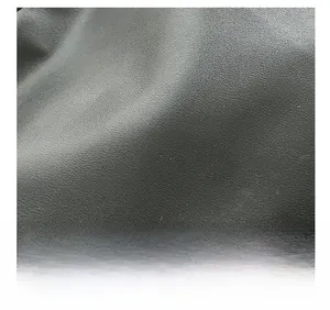 Close-up of the black canvas fabric texture with high-quality grain and stitch detail