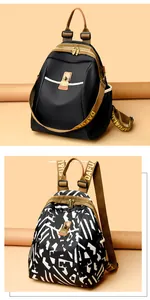 Detail of nylon backpacks in solid black and geometric prints with gold hardware