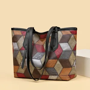 Large geometric patchwork tote bag for women featuring colorful multi-textured PU leather