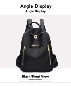 Front view of black oxford fabric backpack for women with gold zippers and metal logo