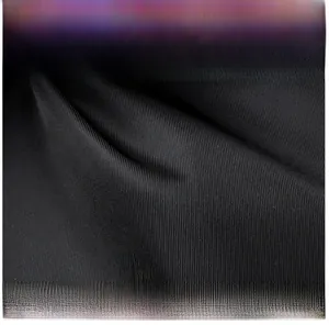 Close-up detail of high-quality black Oxford fabric showing fine weave texture and durability