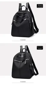 Detailed comparison of black nylon backpacks in large and small sizes with V-shaped patchwork