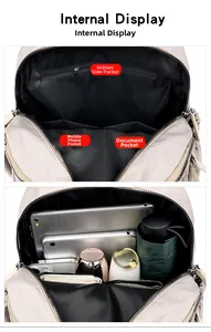 Internal structure of grey nylon backpack showing zipper pocket and spacious capacity