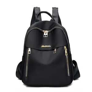 Fashionable black oxford fabric backpack for women with gold zippers and large capacity
