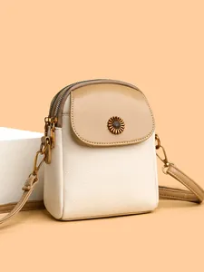 Petit sac bandoulière bicolore en cuir avec fermoir métallique tournesol vintage