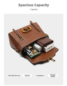 Detailed internal view showing large storage capacity of the brown leather handbag