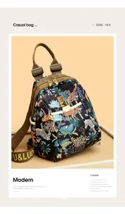Detalle de la mochila de tela Oxford con estampados de animales y cierre de metal dorado