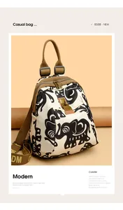 Close-up of elephant print nylon backpack with brown straps and retro metal hardware