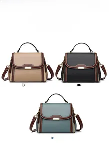 Three leather crossbody bags for women in khaki, black, and blue with lychee texture