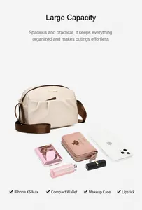 Detail showing large capacity storage of the beige nylon crossbody bag with strap