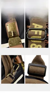 Detail view of retro bronze cross locks and durable woven straps on travel backpack