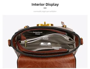 Internal layout showing main compartment and zipper pocket of brown vintage crossbody bag