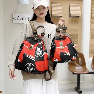 Ensemble sac à dos en nylon imperméable rouge et noir avec logo DAEU et larges bretelles