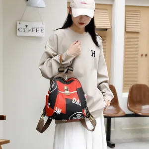 Sac à dos imperméable en tissu Oxford pour femmes avec imprimé graffiti pour voyage mode