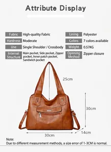 Detailed interior view of brown soft leather tote bag showing multiple zipper compartments