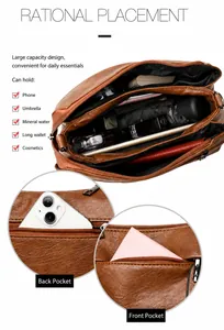 Detaillierte Innenansicht der braunen Ledertasche mit Mehrfachfächern und Reißverschlüssen