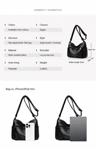 Detailoverzicht van zwarte crossbodytas met vakken en afmetingen van 25x18x10cm groot
