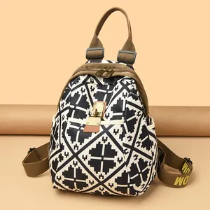 Fashionable geometric print backpack with large capacity and vintage metal buckle detail