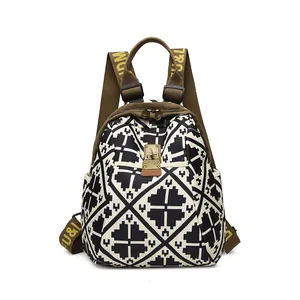 Lightweight large capacity backpack with black and white geometric diamond pattern