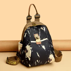 Mochila de viaje Oxford de moda con estampado de salpicaduras y correas con letras