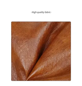 Detail shot of brown leather texture showing high quality soft lychee grain fabric