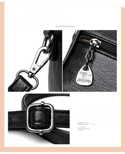 Detail of silver electroplated hardware and lychee grain leather on black handbag