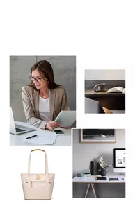 Detail of beige tote bag featuring a front zipper pocket and minimalist commute style